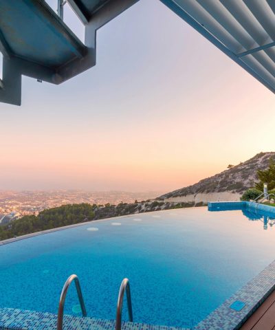 Infinity pool with breathtaking mountain view by Brand Brickz in Vijayawada